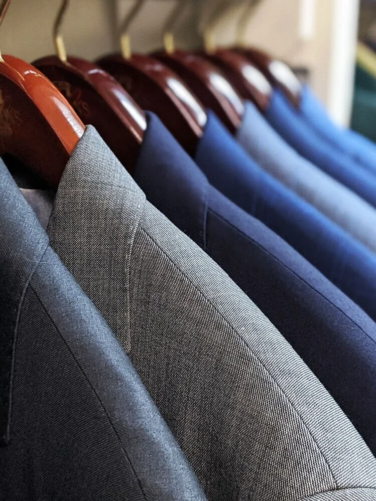 Custom suits on hangers
