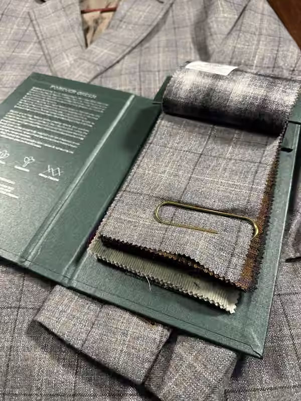 Dormeuil Forever green and gray windowpane cloth